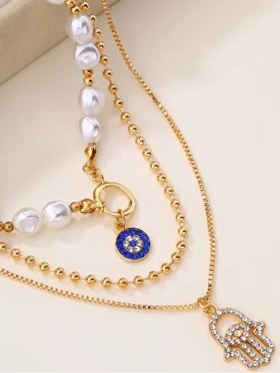 🤩3 pc Gold and Pearl Layered Hamsa Necklace with Blue Pave Charm - Picture 3 of 5
